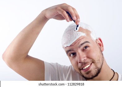 Bald Young Boy Shaving Head