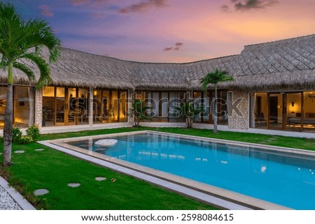 Balenese Pool Villa in Seminyak on the beautiful island of Bali colourful skies lush green tress Bali Indonesia