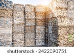 Bales of cardboard and box board with strapping wire ties recycling