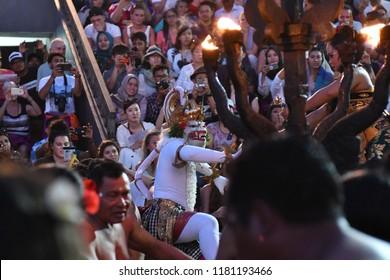 Bali, Indonesia – 13 Sept 2018: Tourists watch traditional Balinese Kecak Dance at Uluwatu Temple on Bali, Indonesia. Kecak (also known as Ramayana Monkey Chant) is very popular cultural show on Bali.