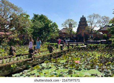 Bali, Indonesia - 15 June 2022: Tourist visiting Saraswati temple in Ubud.  Business starting to operate, in welcoming tourists into the Ubud. The island of Bali has been opened to foreign tourists. 