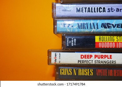 Bali, Indonesia - 23. April 2020: Close Up Of Nirvana, Metallica, Rolling Stone, Deep Purple, Guns N' Roses Band Album On Cassette Record