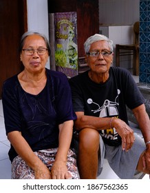 Bali, Indonesia, August 14, 2020: Portrait A Group Of Balinese Family Smiling Looking At The Camera.