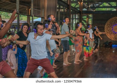 Bali, Indonesia - December 1, 2018: Group Of Adults Freely Dancing With Headphones On In Silent Disco