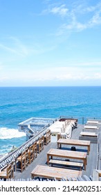 Bali, Indonesia, February 1, 2022. The atmosphere of the Single Fin Cafe on Uluwatu Beach Bali has a very precise location for watching sunset views because it is on the edge of a cliff. 