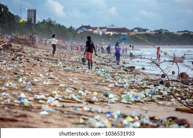 BALI, INDONESIA - FEBRUARY 12, 2017: Beach pollution at Kuta beach, Bali. Many garbage on the beach