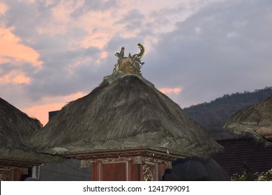 Bali Indonesia, November 2018: Hindu temple roof on sunset sky background.