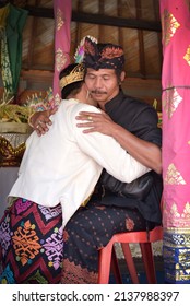 Bali, Indonesia, September 4, 2019. Balinese Groom Hugging His Father In Law, Begging For Blessing During A Balinese Wedding Ceremony.