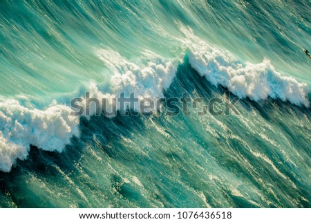 Similar – Aerial Panoramic Drone View Of Blue Ocean Waves Crushing On Sandy Beach in Portugal