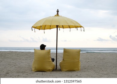 Bali Style Beach Umberella And Couch. Very Relaxing Evening To Enjoy By The Beach.