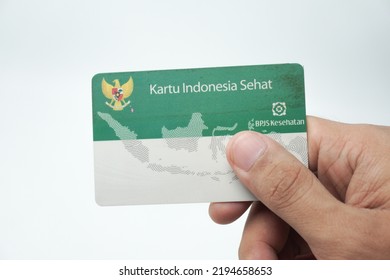 Balikpapan, Indonesia - June 4, 2022 : Holding A Healthy Indonesia Card (Health Insurance Card From The Government Of Indonesia) Under The Auspices Of BPJS.