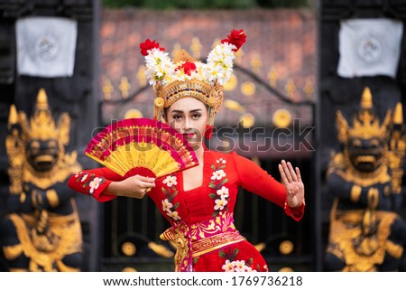 Balinese girl performing traditional dress in bali, indonesia