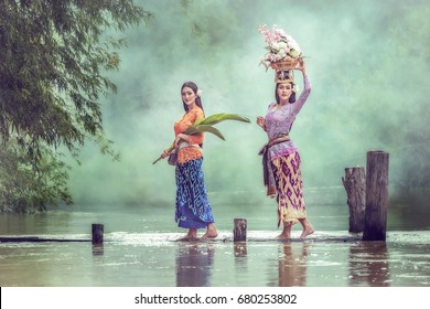 Balinese Lady preparing to go to work.
