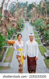 Balinese People Wearing Traditional Clothing In Penglipuran Village Bali