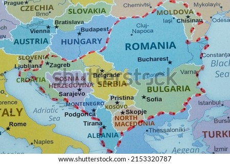 Balkan countries and region on map marked with a pen, Balkan travel route on map with red pen, travel idea, vacation and road trip concept, europe destination, top view