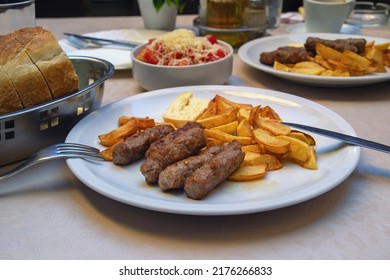 Balkan cuisine. Cevapi - grilled dish of minced meat
