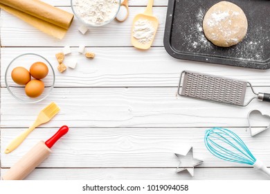 Ball Of Fresh Raw Dough Near Ingedients And Cookware On White Wooden Background Top View Copy Space