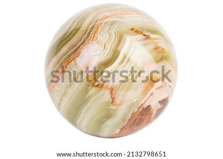 A ball made of onyx bringing good luck. Isolated over white bakcground. Close-up.