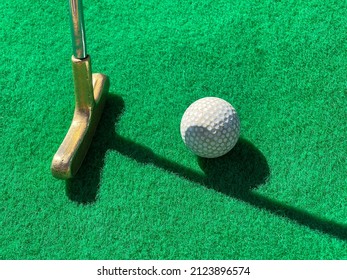 Ball And Mini Golf Club, Close Up. Mini Golf Game For Family And Kids