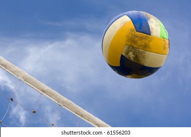 Ball And Net For Beach Volleyball With Sky As Background