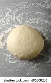 Ball Of Pizza Dough With Dusting Flour, Cooking