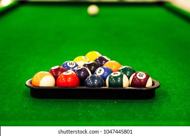 Ball Placed On Billiards Pool Table With Cue Stick And Ready For Play In A Recreation Hall