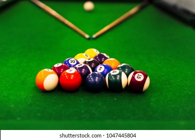 Ball Placed On Billiards Pool Table With Cue Stick And Ready For Play In A Recreation Hall