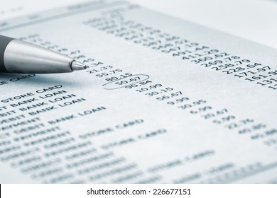 Ball Point Pen On Bank Statement