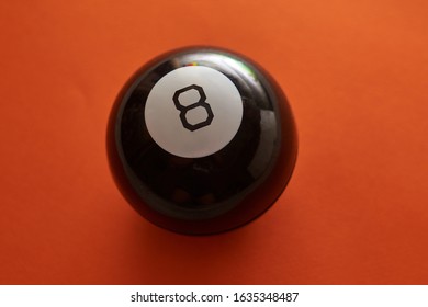 The Ball Of Predictions Figure Eight On An Orange Background 