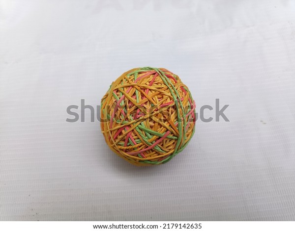 Ball\
from rubber band crafts. round shape. and\
colorful