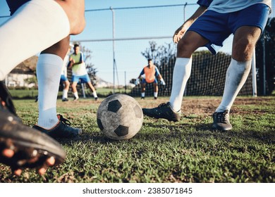 Ball, soccer and men with exercise, grass and health with workout goal, fitness and motion with action. Male players, speed or athlete with a challenge, football and sports with competition or energy - Powered by Shutterstock