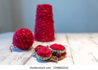 a ball of string and coil red