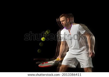 Ball trajectory. Young man, male badminton player in motion and action isolated on dark background. Stroboscope effect. Concept of healthy lifestyle, professional sport, action, motion, hobby, team.