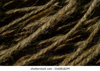 A Ball Of Twine Rope On A Black Background