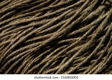 A Ball Of Twine Rope On A Black Background