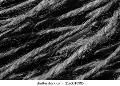 A Ball Of Twine Rope On A Black Background