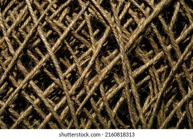 A Ball Of Twine Rope On A Black Background