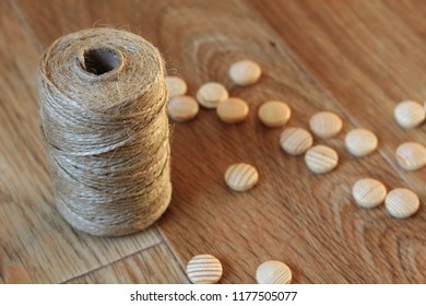 Ball Of Twine And Wooden Buttons