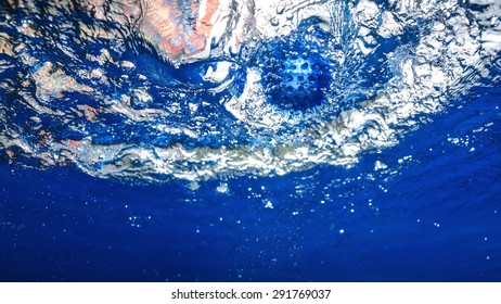 Ball underwater and bubbles