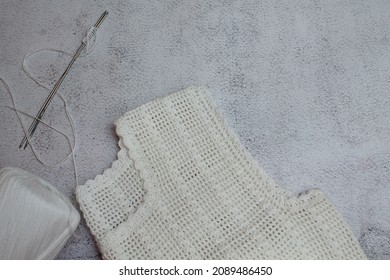 A Ball Of White Yarn, Knitting Needles, White Background