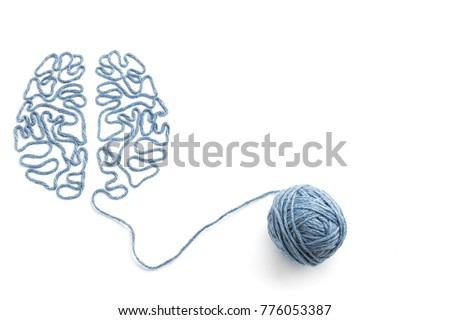 Ball of yarn and thread in the shape of the brain