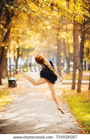 Similar – beautiful young woman having fun outside in park