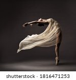 Ballerina Dancing with Silk Fabric, Modern Ballet Dancer in Fluttering Waving Cloth, Pointe Shoes, Gray Background