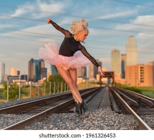 Ballerina on a Railroad Bridge - Powered by Shutterstock