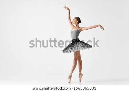 Ballerina in pointe and tutu performance model