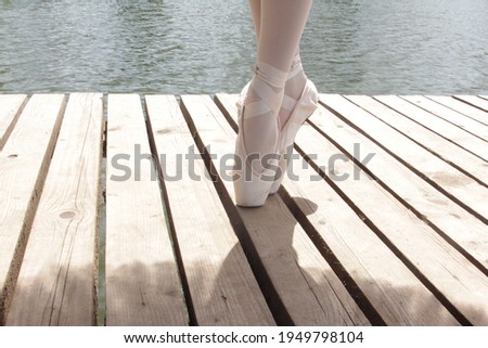 ballerina's feet in pointe shoes