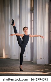 Ballet boy is training on the street