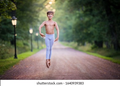 Ballet Boy Trains In The Park In Summer