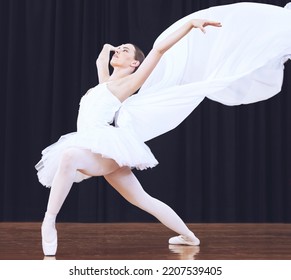 Ballet Dance, Stage Performance And Woman In Theatre Production, Start Of Professional Dancing Competition And Moving With Costume. Ballerina Dancer Student With Balance In Concert At School