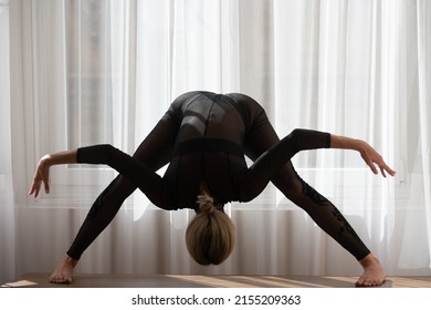 Ballet Dancer. Home Workout. Woman Gymnast, Gymnastics Acrobat. Woman Doing Stretching Up Exercise At Home. Woman Doing Stretching Exercises On The Floor At Home.